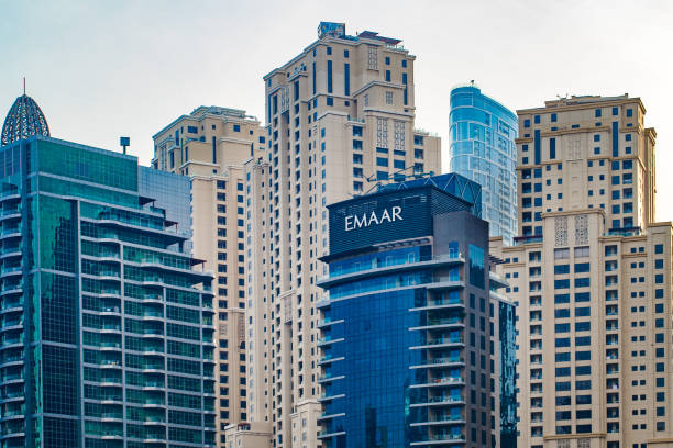 Skyline of luxury apartment buildings in Dubai highlighting the value of one-bedroom units over studios.