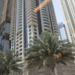 Dubai house down payment: A family saving for a down payment on a new home